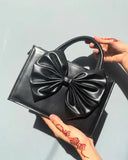 Buy HandBag Gloss Bow Soft Black in Pakistan